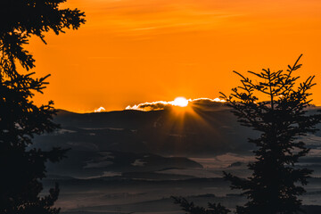 Sunset in winter in mountains