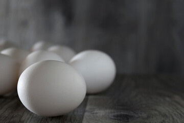 white chicken eggs on the table