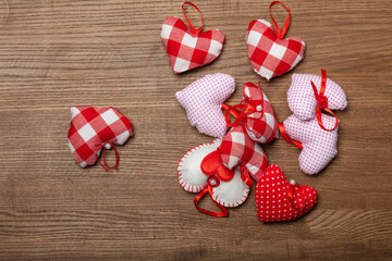 Handmaded hearts on wooden background. Valentine's day card