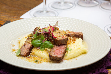 Ancho with Aligot, Chimichurri and fried pork flour.