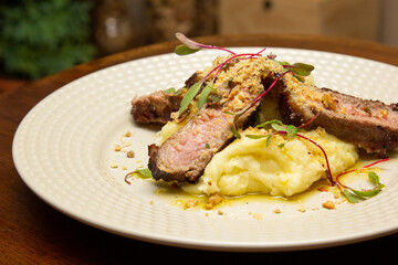 Ancho with Aligot, Chimichurri and fried pork flour.