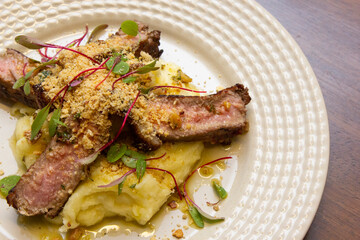 Ancho with Aligot, Chimichurri and fried pork flour.