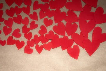 Various romantic red hearts, symbol for Valentine's day, with paper plain background, romantic Valentine design. copy space