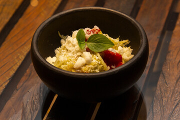 Spaghetti from pupunha with pesto and goat cheese.