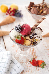 Fruit ice cream on the white wooden table