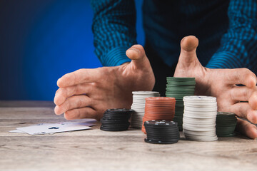 man playing poker on table