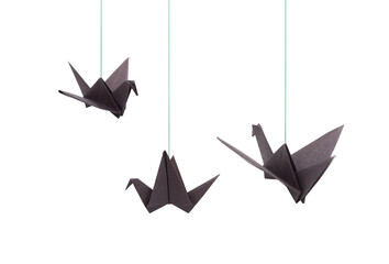 Black paper origami birds hanging with string