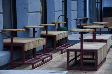 Tables and benches for taking food on the street.