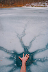 person hand  on the beach