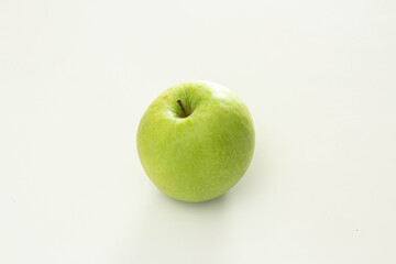 Green apple on white background