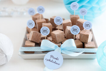 Plakat Tasty homemade chocolate marshmallows on a beautiful candy bar at the first communion party