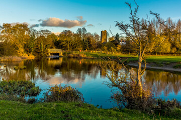 A view across a lake on the River Stour on the western edge of Sudbury, Suffolk