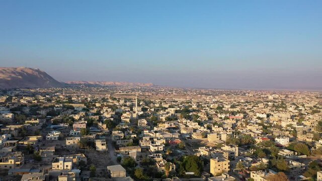 Aerial view over Jericho City in desert Sunset
Drone view of Jericho city, Jordan Valley, Israel,palestine
