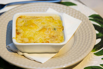 Potato gratin with parmesan cheese.