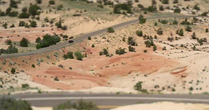 High point of view of a deserty Utah landscape and roads, shot as miniature effect with a tilt shift lens
