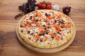 pizza with salami and tomatoes