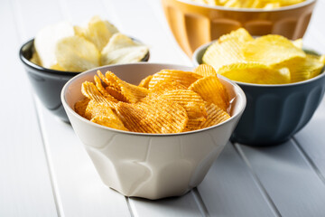 Crispy potato chips with various taste.