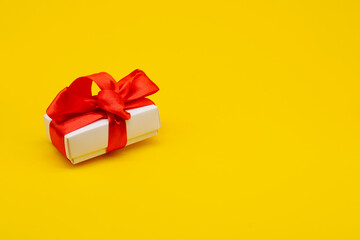 gift craft box on a yellow background. Valentine's Day.