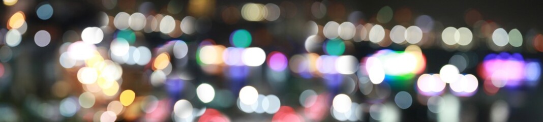 Panorama Abstract color bokeh in dark night.