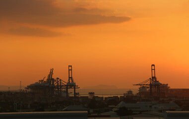 Cargo port at twilight sky.