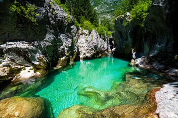 crystal clear soca river in slovenia