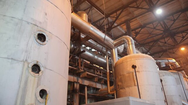 Manometer pipes and valve in boiler room. Thermal power plant piping at modern factory. Sugar beet production plant