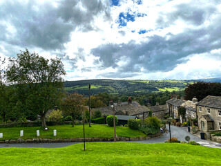 View from, Micklethwaite Lane, with old houses, fields, hills, and a cloudy sky in, Micklethwaite, Keighley, UK