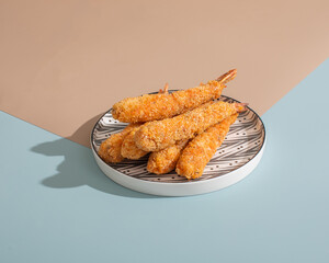Fried shrimp or prawn sticks on isolated background
