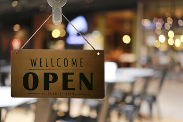 Shop open of storefront sign.