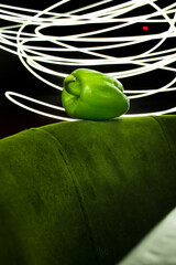 green pepper on black background , green pepper on black , lighting peper