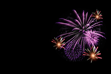 Fototapeta premium Colorful fireworks on black background.