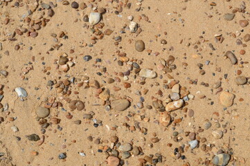 texture of pebbles on sand