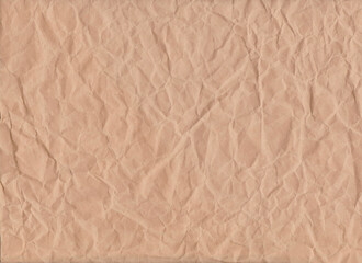 Brown crumpled paper background.