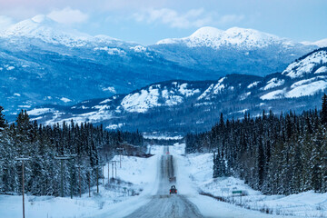 The Alaska Highway in Yukon Territory, northern Canada during December, winter time season with...