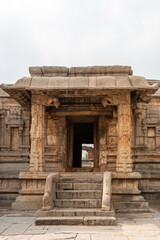 Hampi, Karnataka, India - November 5, 2013: Sri Krishna temple in ruins. Brown stone steps with...