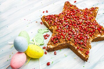 Easter background, food on the table .  Celebratory bread  star