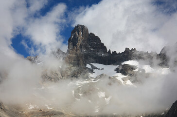 Mountain Peaks in the French Alps Enshrouded in Clouds