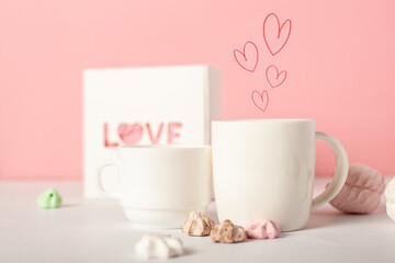 Festive composition for Valentine's Day. Mug and sweets on a pink background. Banner