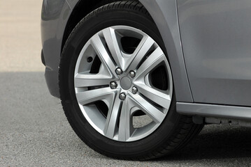 tire and alloy wheel on this small passenger car