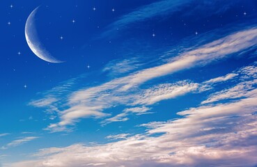 Naklejka na ściany i meble Crescent moon with beautiful sunset background . Generous Ramadan . Religion background