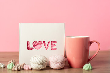 A mug and gift wrap for a loved one. Valentine's Day concept. Banner