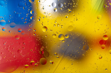 The abstract composition with oil drops in water.
