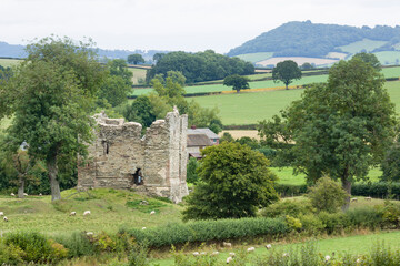 Hopton Castle in Shropshire Hills landscape, UK