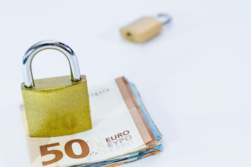 Money Euro value banknotes with padlock, European Union payment system, isolated on white