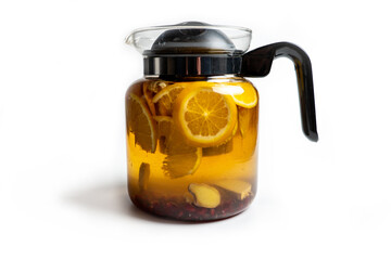 tea with lemon, ginger and pomegranate beans on white background