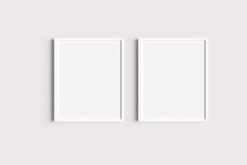 Set of two white portrait picture frame mockups