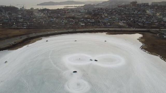Aerial view over a drift ice rink in Nakhodka Russia.