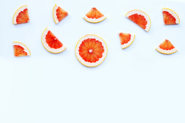 High vitamin C. Juicy grapefruit slices on white.