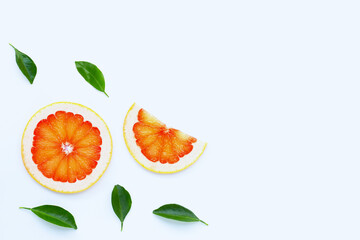 High vitamin C. Juicy grapefruit slices on white.