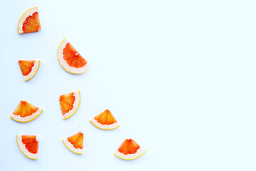High vitamin C. Juicy grapefruit slices on white.